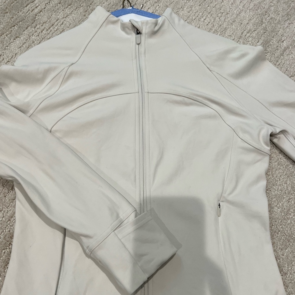 Lululemon. Size 8 new cropped bone color tracker jacket